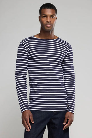 Man wearing navy blue and white striped long-sleeve shirt, casual style